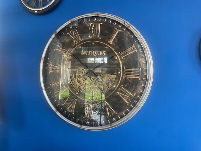 Klok_horloge_design_draaiende-raderen